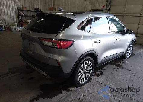 2021 Ford Escape Titanium z USA, uszkodzony, nr VIN 1FMCU9J90MUA56047